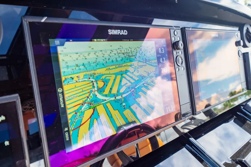  Yacht Photos Pics Simrad navigation display on 2020 Fjord 44 Open yacht, showing detailed marine chart.