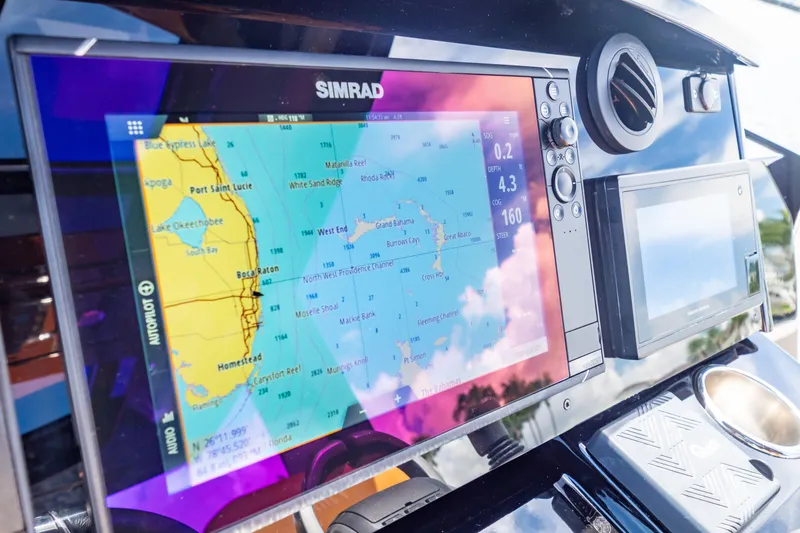 Yacht Photos Pics Simrad navigation system on 2020 Fjord 44 Open boat, displaying nautical map.