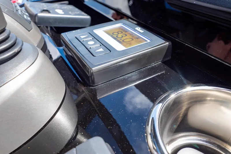  Yacht Photos Pics Control panel on 2020 Fjord 44 Open yacht with digital display and cup holder.