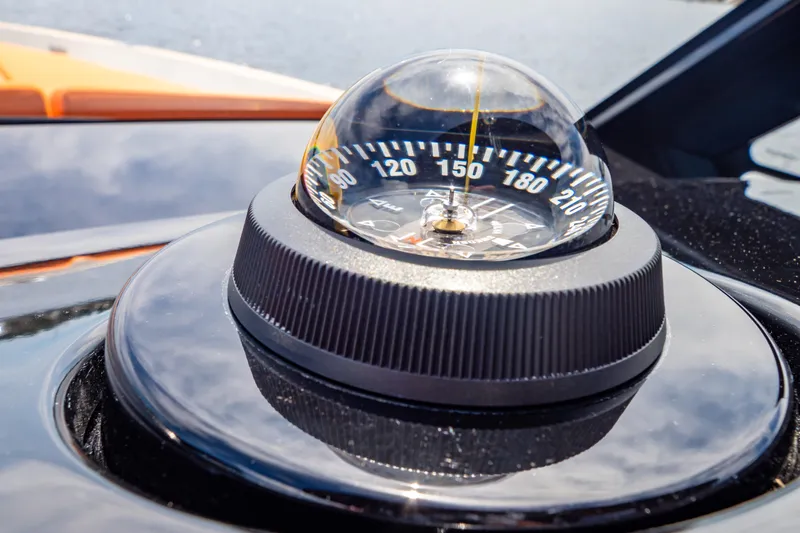  Yacht Photos Pics Close-up of a compass on a 2020 Fjord 44 Open yacht dashboard.