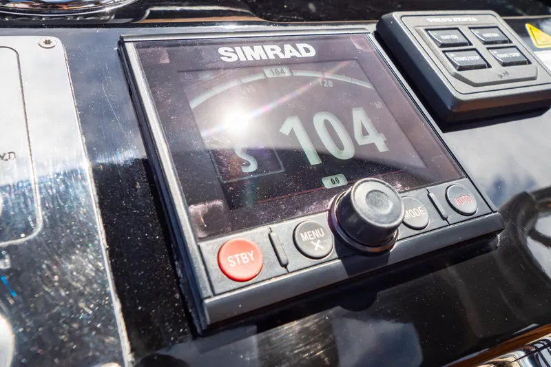  Yacht Photos Pics Simrad navigation display on 2020 Fjord 44 Open yacht dashboard.