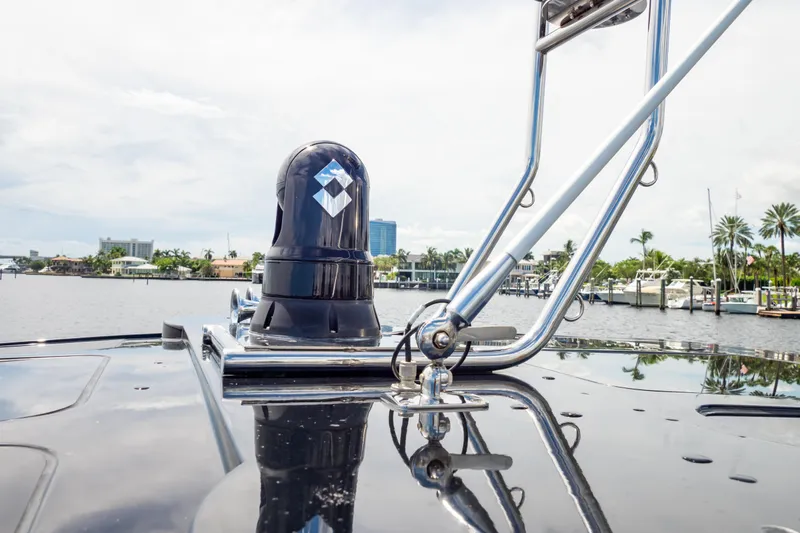  Yacht Photos Pics 2020 Fjord 44 Open yacht deck with radar, docked in a scenic marina.