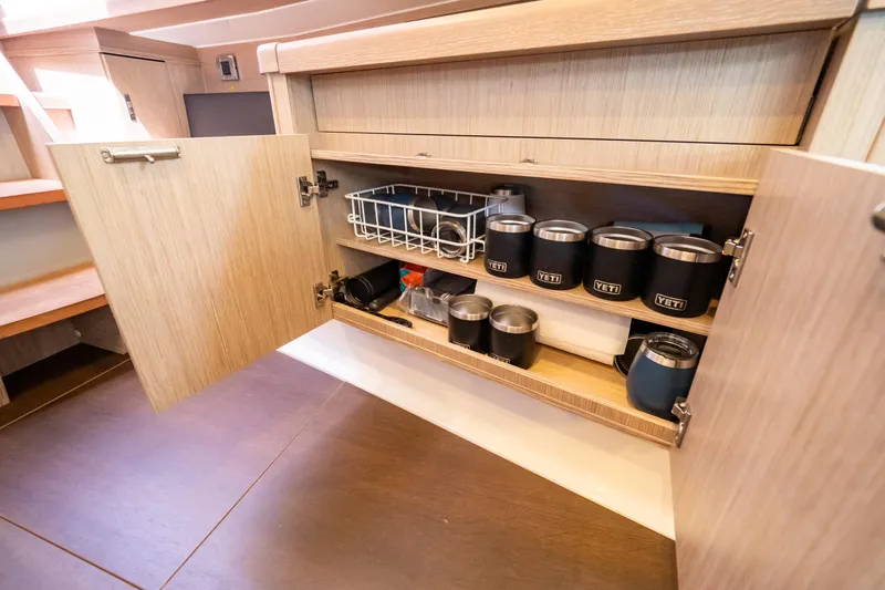  Yacht Photos Pics Open cabinet in 2020 Fjord 44 Open yacht, storing Yeti cups and kitchen items.