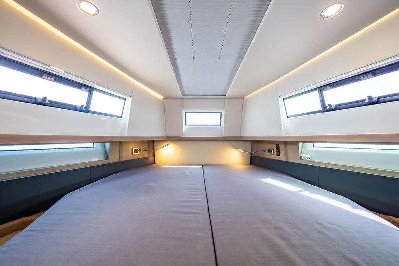  Yacht Photos Pics Luxurious interior cabin of 2020 Fjord 44 Open yacht with modern lighting and windows.
