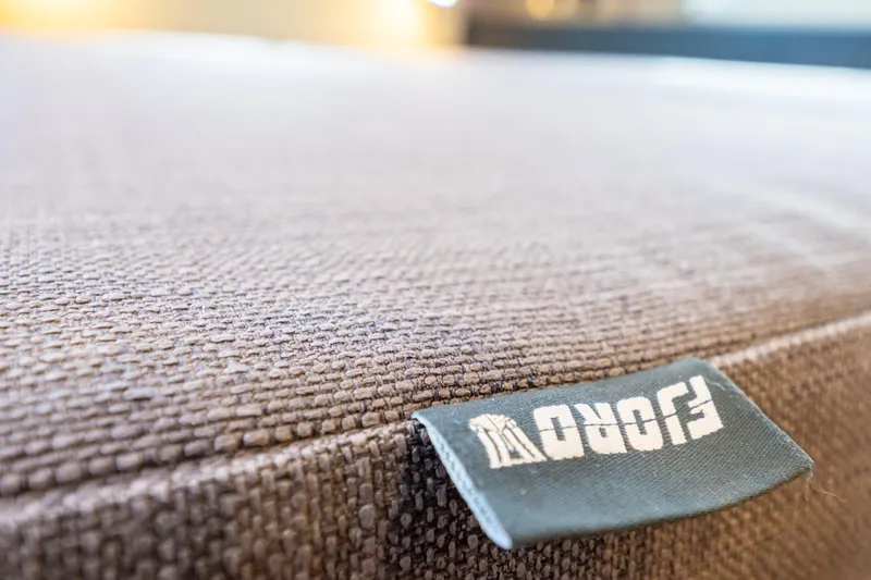  Yacht Photos Pics Close-up of Fjord 44 Open 2020 boat upholstery with logo tag.