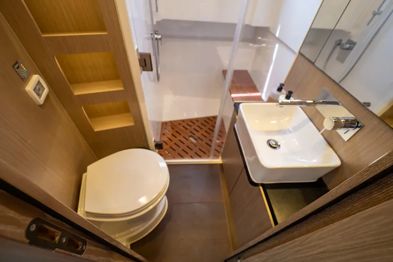  Yacht Photos Pics Modern bathroom in 2020 Fjord 44 Open yacht with sink, toilet, and shower.