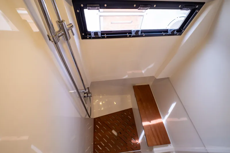  Yacht Photos Pics Interior of 2020 Fjord 44 Open yacht, featuring a sleek shower area with window.