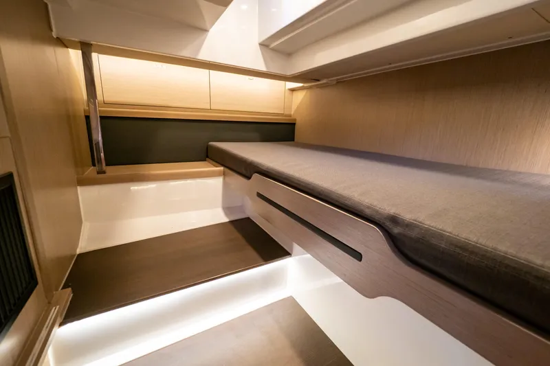  Yacht Photos Pics Interior cabin of 2020 Fjord 44 Open yacht, featuring sleek wooden design and modern lighting.
