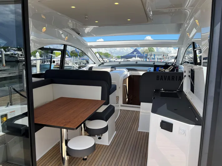 Inventory Clearance Yacht Photos Pics 2023 Bavaria SR41 COUPE interior with modern seating and sleek design.
