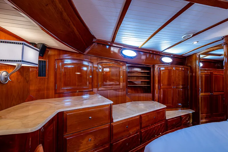 Hooligan VI Yacht Photos Pics Luxurious wooden interior of 2005 Hinckley Talaria 55 MY yacht cabin.