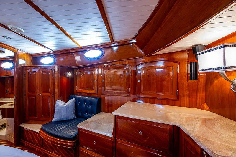 Hooligan VI Yacht Photos Pics Luxurious wooden interior of 2005 Hinckley Talaria 55 MY yacht cabin.