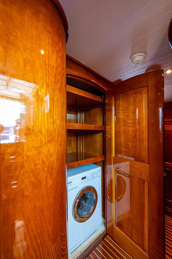 Hooligan VI Yacht Photos Pics Luxurious wooden interior of 2005 Hinckley Talaria 55 MY yacht with built-in washer.