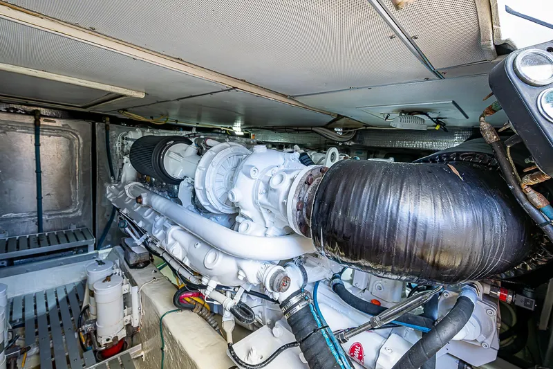 Hooligan VI Yacht Photos Pics Engine room of 2005 Hinckley Talaria 55 MY yacht, showcasing detailed machinery and components.