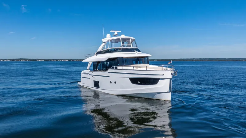 Just Joanne Yacht Photos Pics Luxury Absolute NAVETTA 58 yacht cruising on open water, 2019 model.