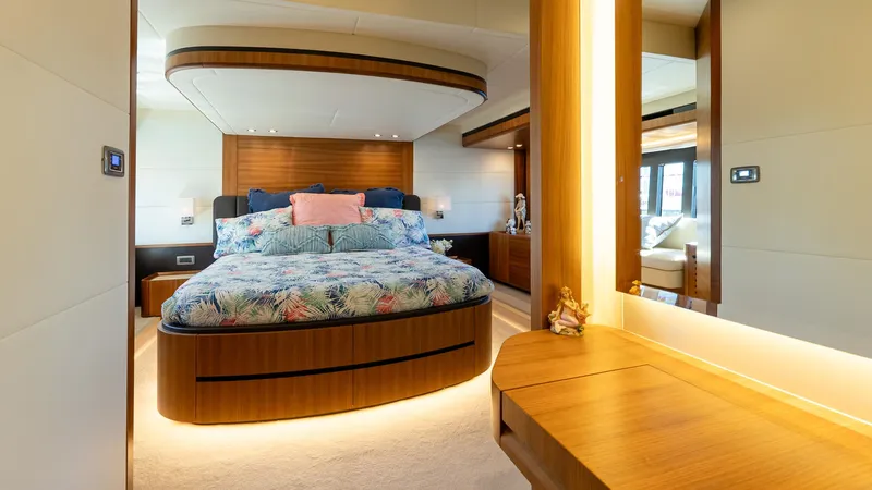 Just Joanne Yacht Photos Pics Luxurious bedroom interior of 2019 Absolute NAVETTA 58 yacht with elegant wood finishes.