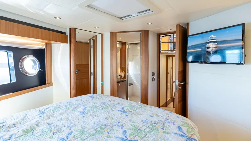 Just Joanne Yacht Photos Pics Luxurious interior of 2019 Absolute NAVETTA 58 yacht with elegant wood finishes and modern amenities.