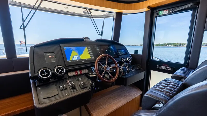 Just Joanne Yacht Photos Pics 2019 Absolute NAVETTA 58 yacht helm with navigation screens and leather seating.