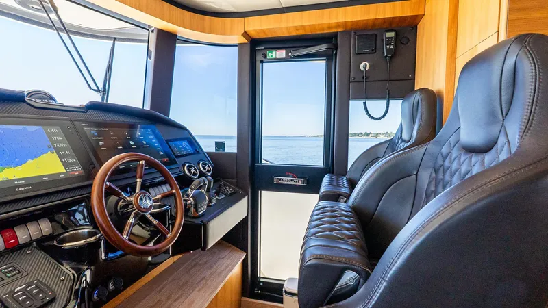 Just Joanne Yacht Photos Pics Luxurious helm of 2019 Absolute NAVETTA 58 yacht with leather seats and advanced navigation systems.