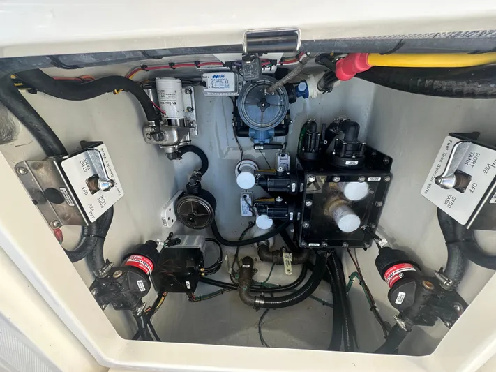  Yacht Photos Pics 2024 SeaVee 322z engine compartment with various mechanical components and wiring.