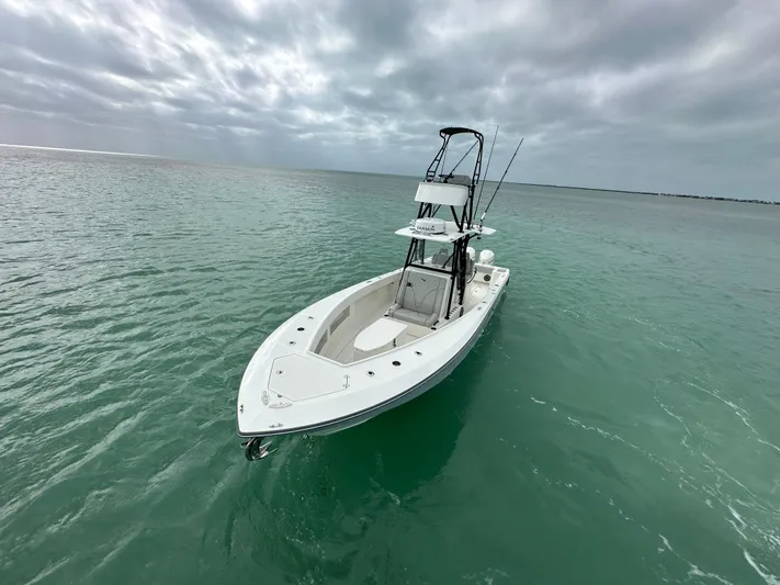  Yacht Photos Pics 2024 SeaVee 322z boat on calm ocean waters under cloudy skies.