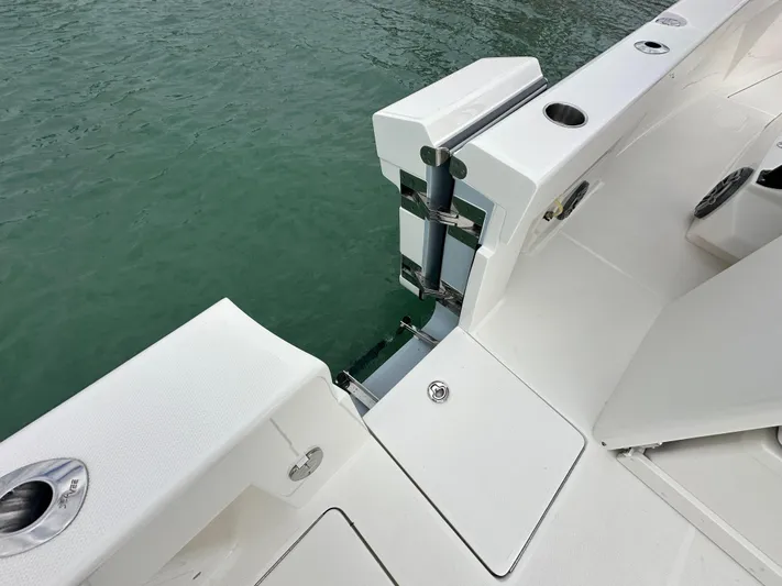  Yacht Photos Pics 2024 SeaVee 322z boat deck detail with rod holders and water view.