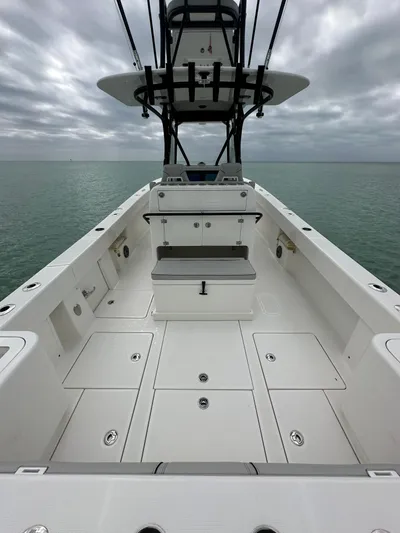  Yacht Photos Pics 2024 SeaVee 322z boat deck with open sea view, overcast sky.