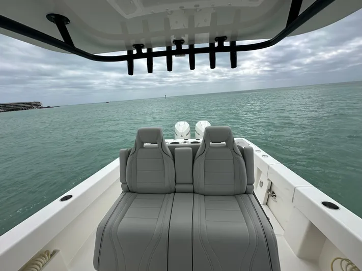  Yacht Photos Pics 2024 SeaVee 322z boat interior with dual seats, ocean view.
