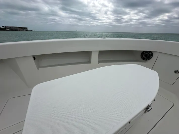  Yacht Photos Pics 2024 SeaVee 322z boat interior with ocean view under cloudy sky.