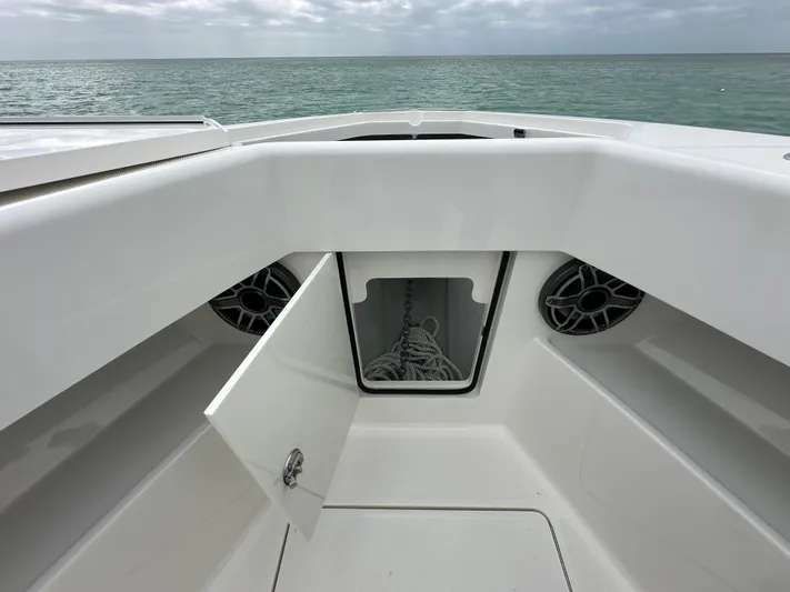  Yacht Photos Pics 2024 SeaVee 322z boat bow with anchor storage and ocean view.