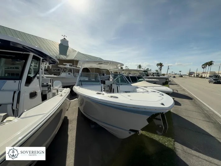  Yacht Photos Pics 2024 Blackfin 272 DC boats displayed at Sovereign Yacht dealership.