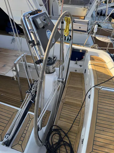  Yacht Photos Pics 2004 X-Yachts X 46 sailboat cockpit with steering wheel and teak decking.