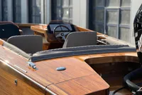 2024 Custom Bowrider boat with sleek wooden finish and modern interior design.