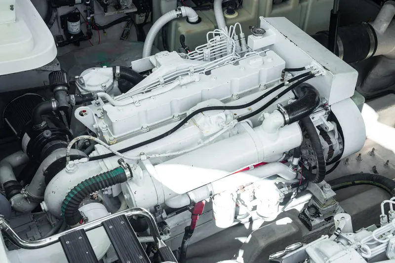  Yacht Photos Pics Engine compartment of a 2004 Sea Ray 420 Sundancer yacht, showcasing detailed machinery.