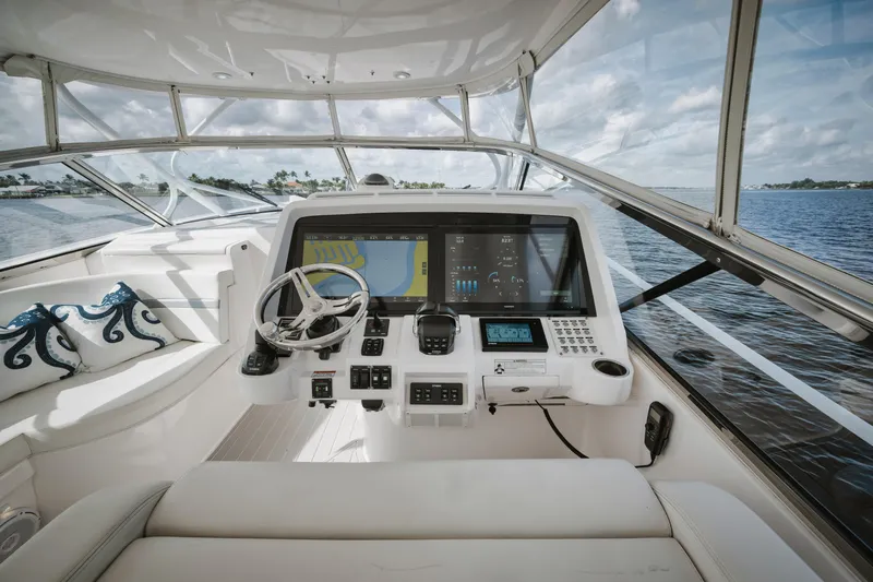  Yacht Photos Pics 2018 Intrepid 475 Sport Yacht helm with modern navigation system and ocean view.