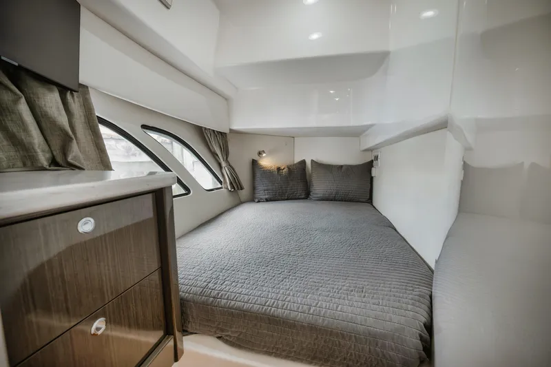  Yacht Photos Pics 2018 Intrepid 475 Sport Yacht cabin with cozy bed and modern interior design.