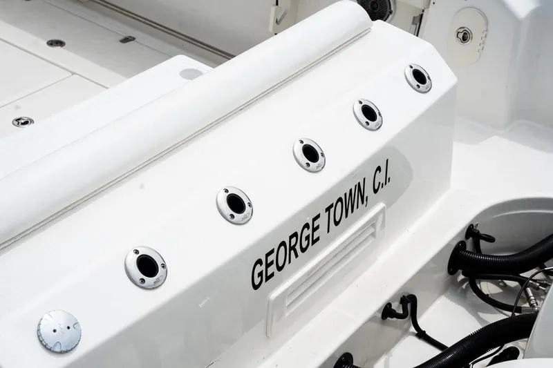  Yacht Photos Pics 2014 Boston Whaler 350 Outrage boat deck with "George Town, C.I." text.