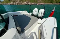 2020 Axopar 37 Cross Cabin with Mercury engines on a scenic waterway.