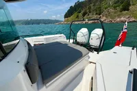 2020 Axopar 37 Cross Cabin boat with Mercury engines on scenic water.
