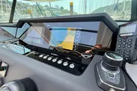 Control panel of 2020 Axopar 37 Cross Cabin with Simrad display and joystick.