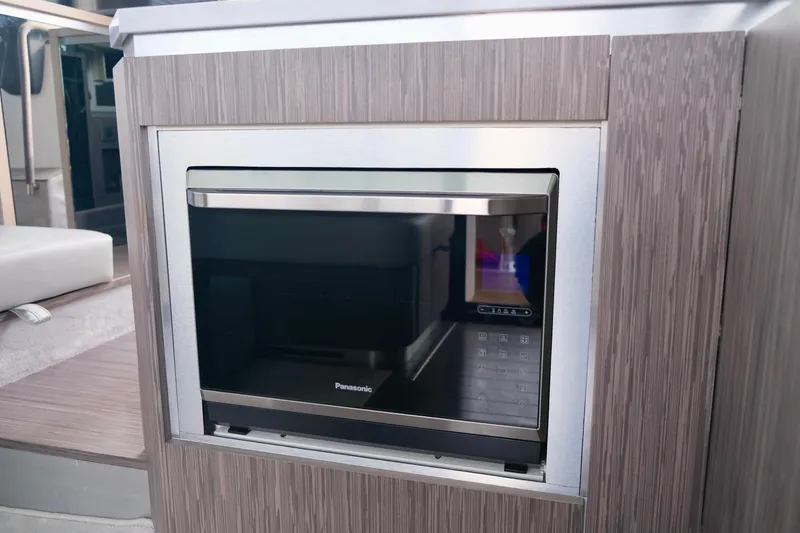  Yacht Photos Pics Built-in microwave on 2022 Sessa Marine Coupe 47 yacht kitchen.
