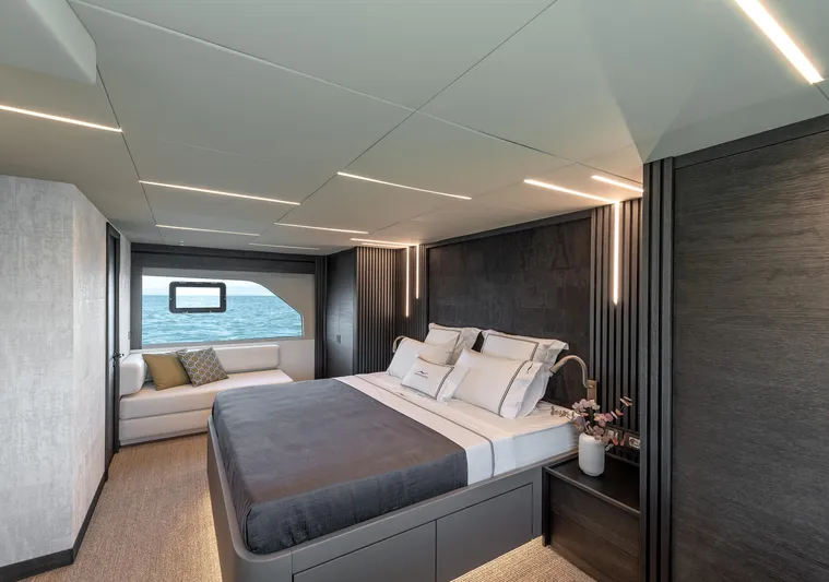 Numarine 22xp Hull #7 Yacht Photos Pics Luxurious bedroom interior of 2025 Numarine 22XP yacht with ocean view.