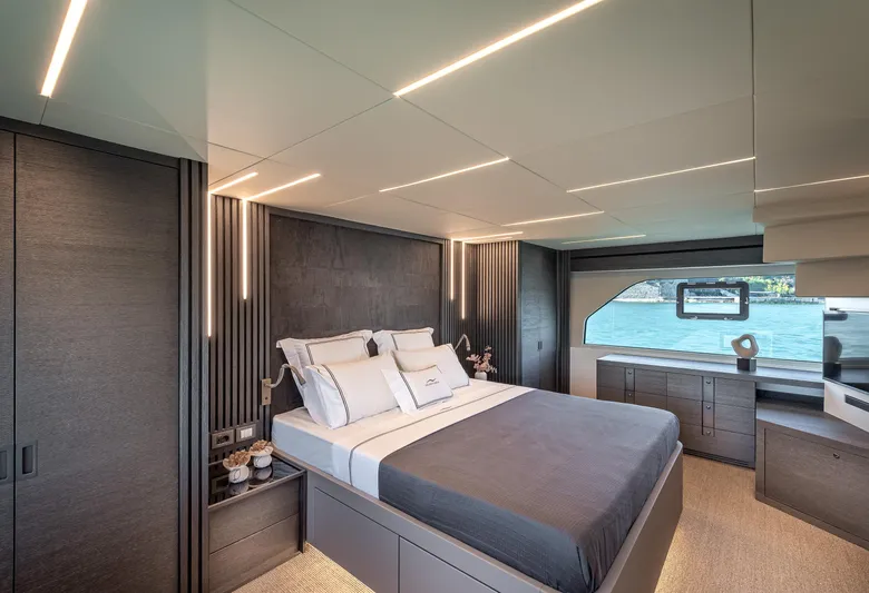 Numarine 22xp Hull #7 Yacht Photos Pics Luxurious bedroom interior of 2025 Numarine 22xp yacht with modern design and waterfront view.