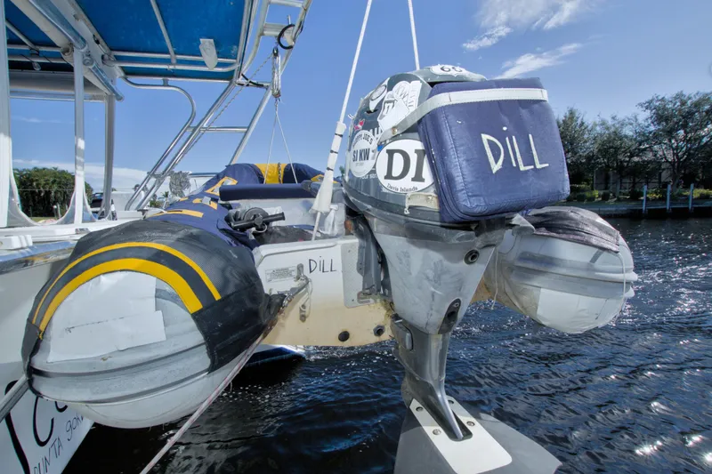 Scout Yacht Photos Pics Inflatable boat with motor labeled "Dill" on a 1996 Manta 40 yacht.