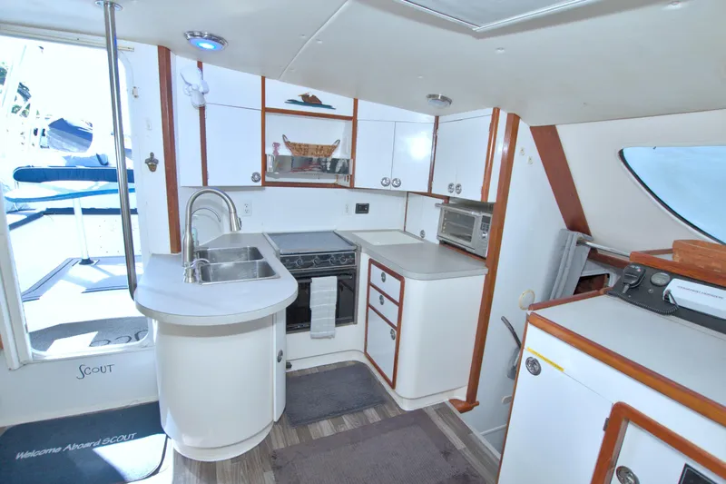 Scout Yacht Photos Pics Interior of 1996 Manta 40 yacht kitchen with modern amenities and sleek design.
