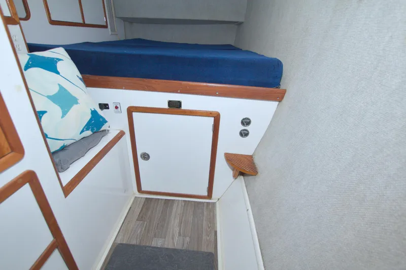 Scout Yacht Photos Pics 1996 Manta 40 interior cabin with bed, storage, and nautical decor.