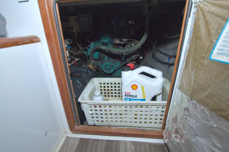 Scout Yacht Photos Pics Engine compartment of 1996 Manta 40 with Shell Rotella oil container.