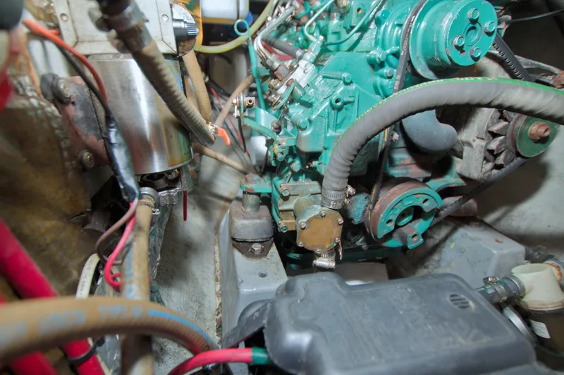 Scout Yacht Photos Pics Engine compartment of a 1996 Manta 40 sailboat, showcasing mechanical components and wiring.