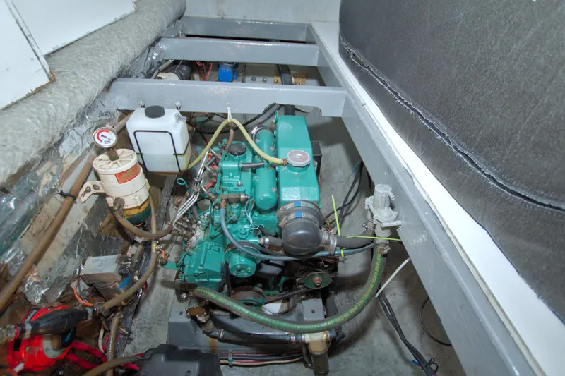 Scout Yacht Photos Pics Engine compartment of a 1996 Manta 40 boat, showcasing mechanical components and wiring.