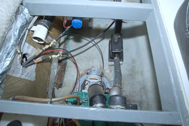 Scout Yacht Photos Pics Engine compartment of a 1996 Manta 40 boat, showing wiring and mechanical components.