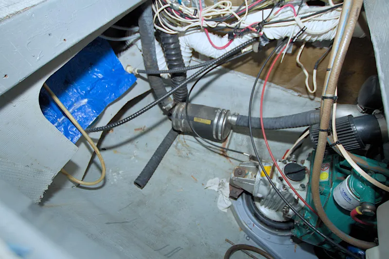Scout Yacht Photos Pics Engine compartment of a 1996 Manta 40 sailboat with visible wiring and components.